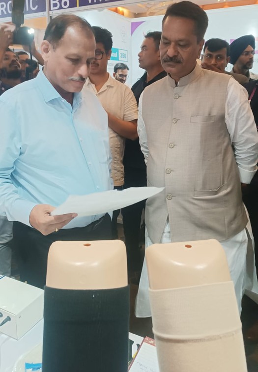 Assam's Health Minister visiting the Arkaya Optics stall in Guwahati